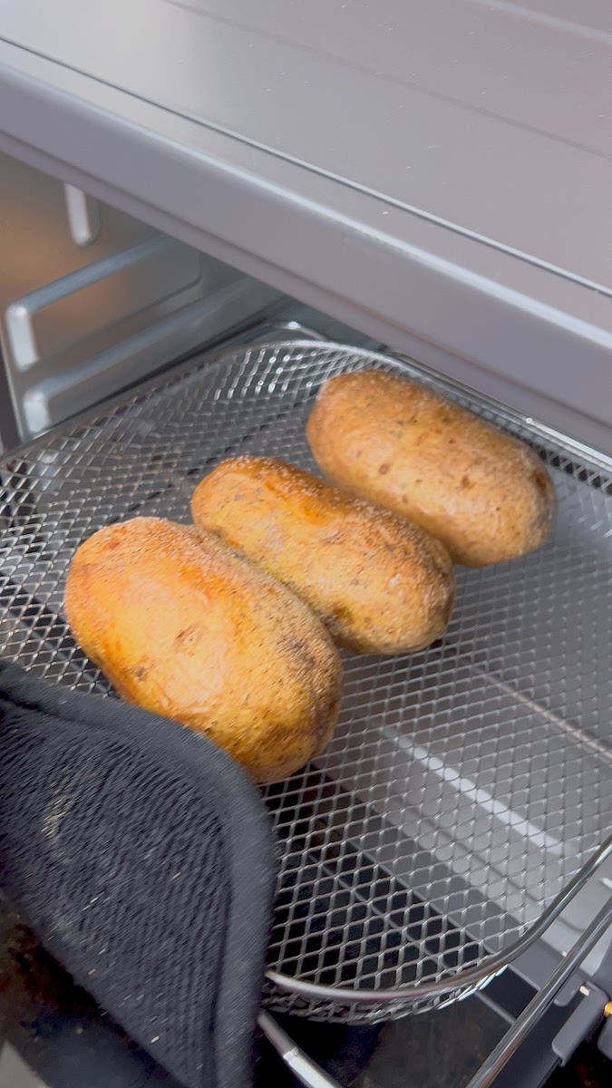 Follow the video for instructions. Air fryer potatoes at 390 degrees for 25-30min or until fork tender.